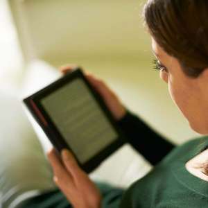 woman reading an e-book